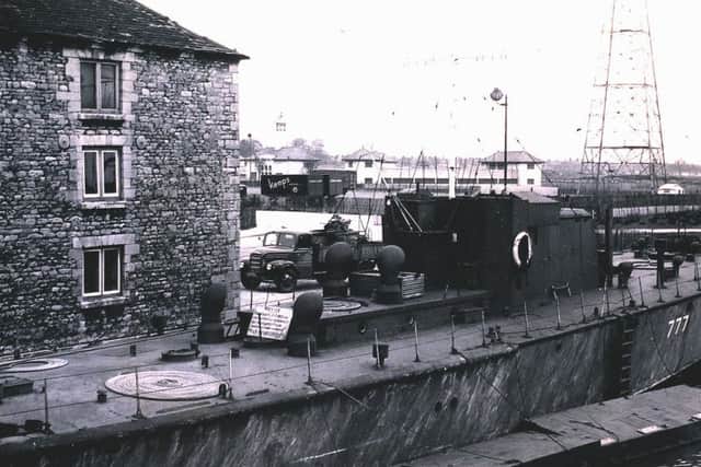 Naval craft moored at the Custom House