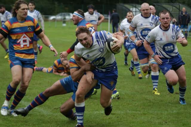 Tom Gulland in action for the Lions against Old Halesonians. Picture: Mick Sutterby
