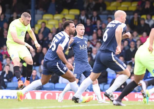 Marcus Maddison smacks home his late equaliser for Posh at Southend. Photo: David Lowndes.