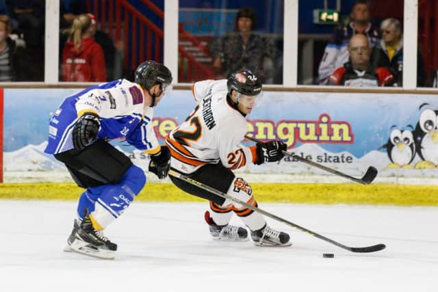 Phantoms man-of-the-match Tom Norton in action against Jason Silverthorn of Telford. Picture: Tom Scott