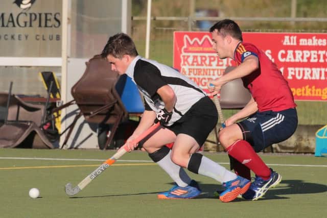 City of Peterborough skipper Ross Booth (right) in action at Harleston Magpies.