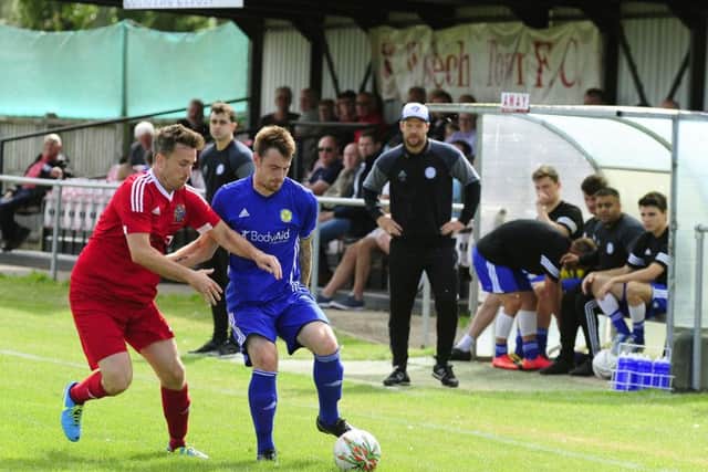 Josh Moreman (right) in action for Peterborough Sports in their 4-1 FA Cup win at Wisbech.