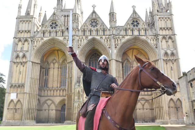 Nigel Amos as King Harold with the Battle 1066 re-enactors visiting Peterborough EMN-160210-201634009