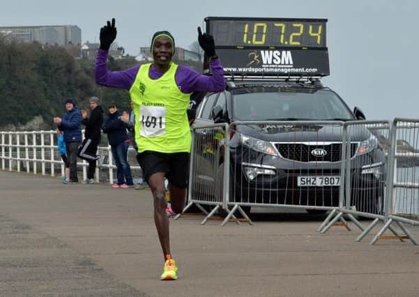 Gideon Kimosop wins the Larne Half-Marathon.
