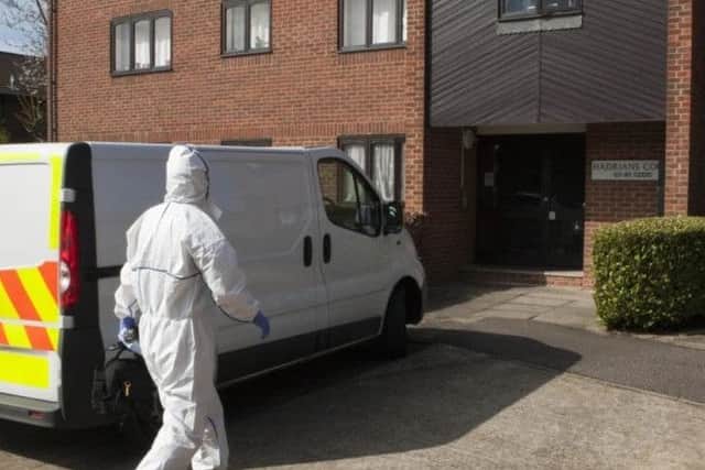Police searching Michael Danaher's Peterborough flat after his arrest