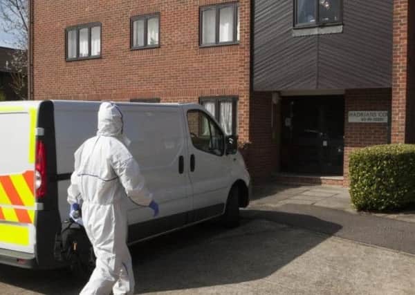 Police searching Michael Danaher's Peterborough flat after his arrest