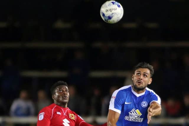 Ryan Tafazolli in action for Posh against MK Dons. Photo: Joe Dent/theposh.com.