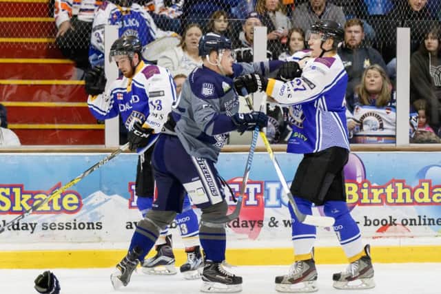 Phantoms' Craig Wallis and Shefield's Ashley Calvery get physical. Photo: Tom Scott - AMOimages.com.