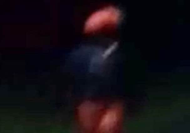 A clown running away after being confronted. Pictures via SWNS. NNL-161010-123636001