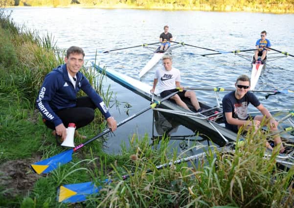 James Fox (on bank) with Benjamin Mackenzie and Harry Masterson on his return to Peterborough City Rowing Club.