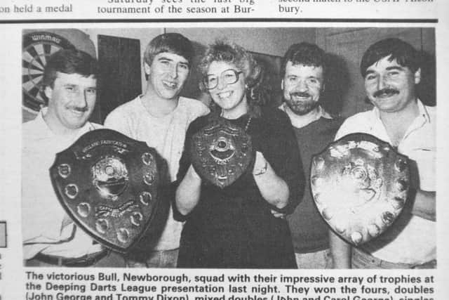The all-conquering Bull, Newborough darts team. From the left they are Tommy Dixon, John George, Carol George, Terry Leverton and Mario Minghella.