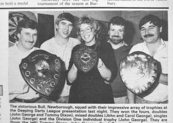 The all-conquering Bull, Newborough darts team. From the left they are Tommy Dixon, John George, Carol George, Terry Leverton and Mario Minghella.