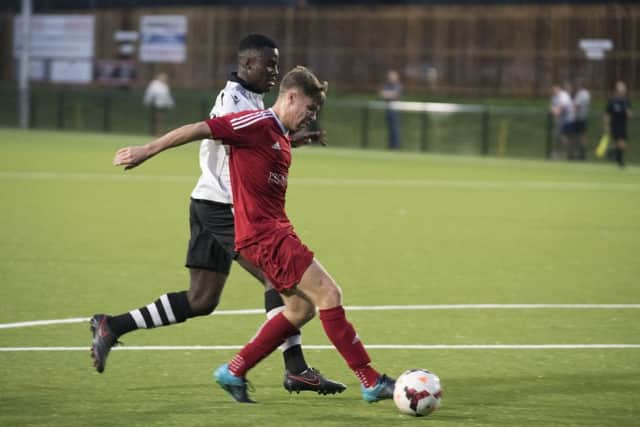 Harry Limb scored twice for Wisbech against Deeping.