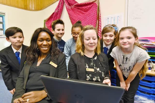 Ormiston Meadows  Academy principal Jean Watts and vice principal Elizabeth Papworth with able, gifted and talented pupils taking part in a new "university" sponsored course. EMN-161110-182320009