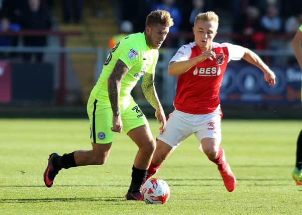 Late replacement George Moncur in action for Posh at Fleetwood. Photo: Joe Dent/theposh.com.