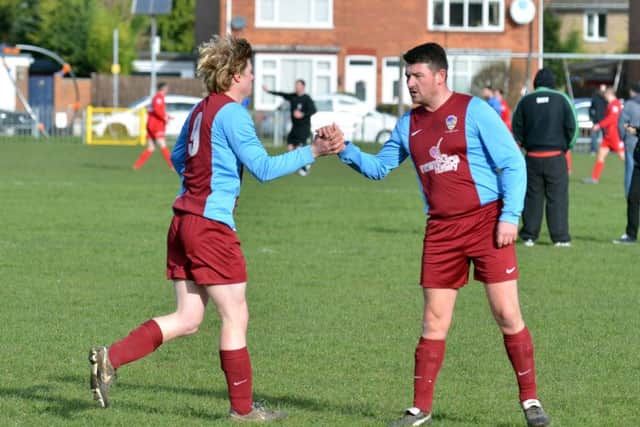 Marcus Parry (left) scored twice for Moulton Harrox at AFC Stanground Sports