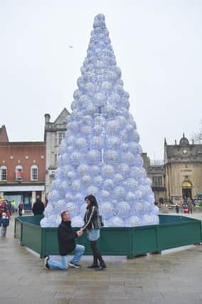 Engaged couple Ian Peasgood and Anita Robson . He proposed in front of the  city centre christmas tree EMN-151215-160232009
