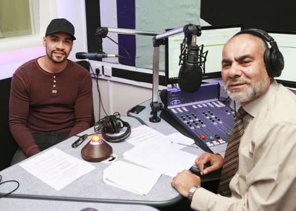 Louis Smith gives an interview to Ansar Ali at Salaam Radio. Picture by Terry Harris