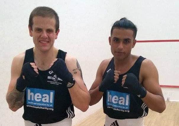 Peterborough Police Amateur Boxing Club fighters Rich Ellison (left) and Awais Ahmed.
