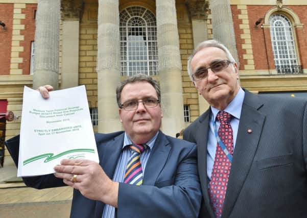 Councillors David Seaton and John Holdich with budget proposals in a previous year EMN-151117-162420009