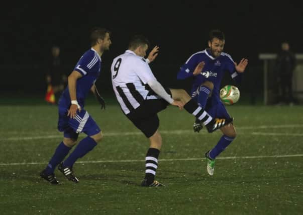 Peterborough Northern Star's James Hill-Seekings (9) in action against Yaxley. Photo: Tim Gates.