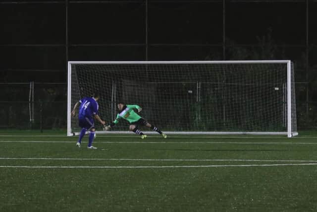 John-Paul Duncliffe scores Yaxley's sixth and final penalty past Peterborough Northern Star goalkeeper Dan George. Photo: Tim Gates.
