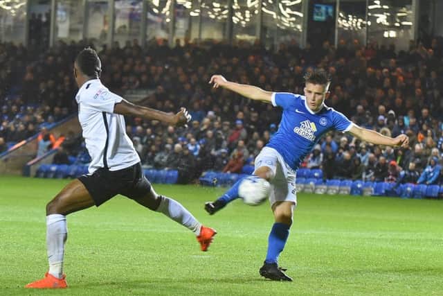 Tom Nichols scores for Posh against Northampton. Photo: David Lowndes.