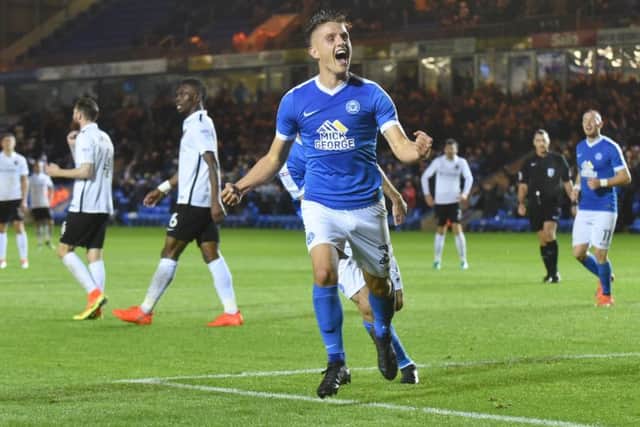 Posh striker Tom Nichols clearly enjoyed his goal-den moment against Cobblers. Photo: David Lowndes.