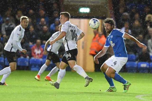 Michael Bostwick (right) in action for Posh against Northampton. Photo: David Lowndes.