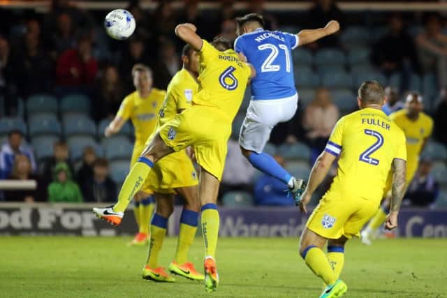 Posh striker Tom Nichols scores against AFC Wimbledon in August. Photo: Joe Dent/theposh.com.