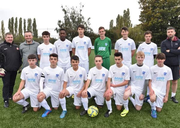 Pictured are Hampton Under 16s before their 6-2 win over Ramsey Colts in the Hunts Cup. From the left are, back, Nigel Walker, Andy Szalajko, Kudakwashe Muchirahondo, Isaac Saywell, Aidan Mulhern, Harry Walker, Logan West-Ley, Brandon Orchard, Tony Nicholson, front, Harry Dee, Patrick Boyle, Rory Nicholson, Ollie Oakley, Jack Szalajko, Samuel Gott and Kev Spindari.