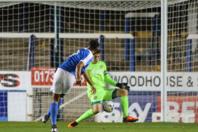 Deon Moore scores the second goal. Picture: Joe Dent