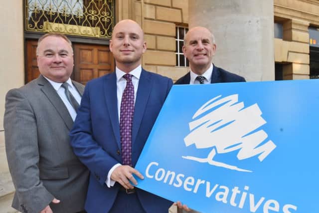 Jay Beecher with Tory councillors Wayne Fitzgerald and John Peach EMN-161023-184527009