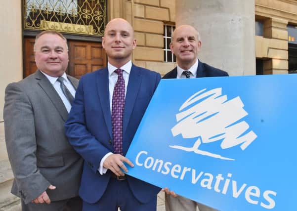Jay Beecher with Tory councillors Wayne Fitzgerald and John Peach EMN-161023-184527009