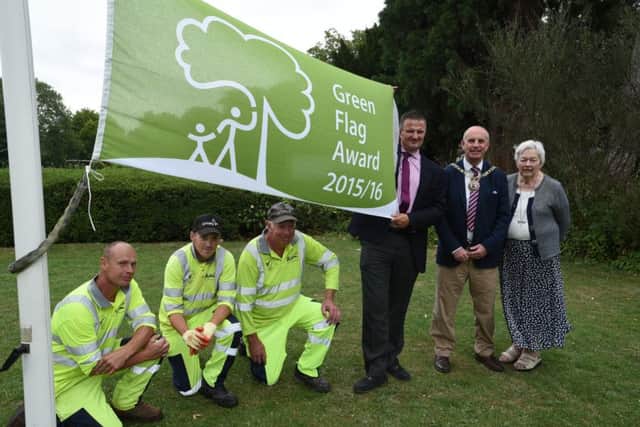 Coun Gavin Elsey, Coun John Peach, Yvonne Lowndes, chairman of the Friends of Central Park with Ian lilley, Steve Woodruff and Arthur Fisher (park rangers) with their new Green Flag EMN-150816-170026009