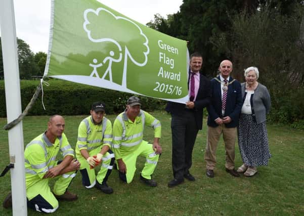 Coun Gavin Elsey, Coun John Peach, Yvonne Lowndes, chairman of the Friends of Central Park with Ian lilley, Steve Woodruff and Arthur Fisher (park rangers) with their new Green Flag EMN-150816-170026009