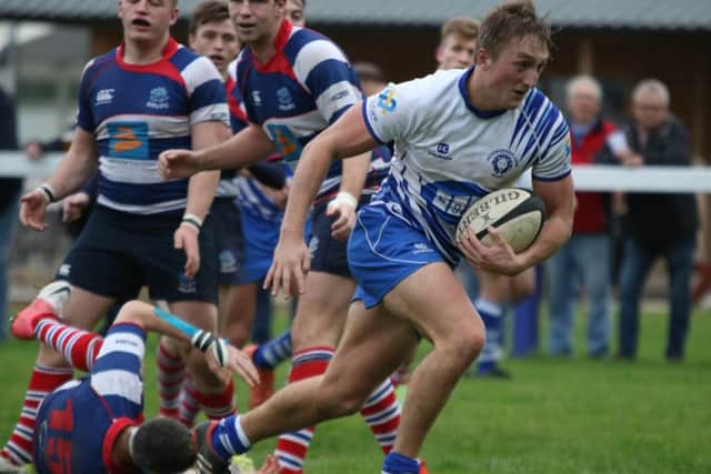 Tom Gulland nips in for the first Lions try. Picture: Mick Sutterby