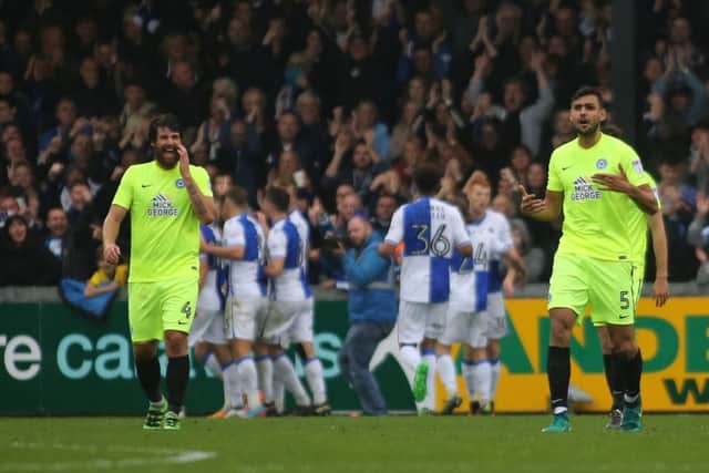 Michael Bostwick (left) and Ryan Tafazolli try and rally their Posh team-mates after Bristol Rovers take the lead. Photo: Joe Dent/theposh.com.