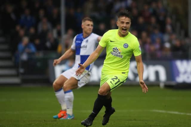 Tom Nichols celebrates after claiming a late winning goal fotr Posh at Bristol Rovers. Photo: Joe Dent/theposh.com.