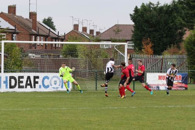 Matt Barber scores the only goal of the game for Peterborough Northern Star against Sileby. Photo: Tim Gates.