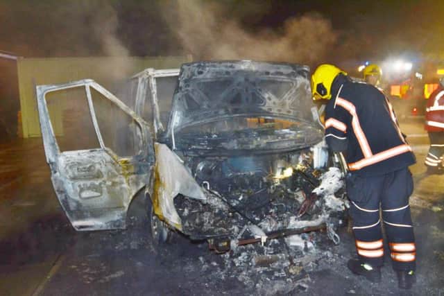 Fire at Honeyhill School, Paston - burnt out mini-bus and vandalised second minibus EMN-161031-230608009