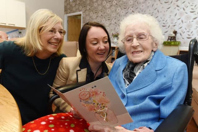 102-year-old birthday of Margaret Kruschina at Aliwal Manor care home, Whittlesey. She is with daughter Naomi Phillips and granddaughter Elizabeth Phillips EMN-161030-181302009