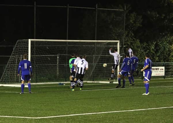 Wilkins Makate scores for Peterborough Northern Star at Yaxley. Photo: Tim Gates.