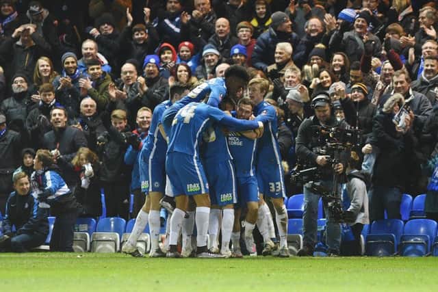 Scenes of great joy as Posh celebrate an FA Cup goal against West Brom last season.