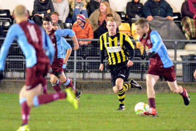 Action from Holbeach 1, Deeping Rangers 1. Deeping are in possession. Photo: Tim Wilson.