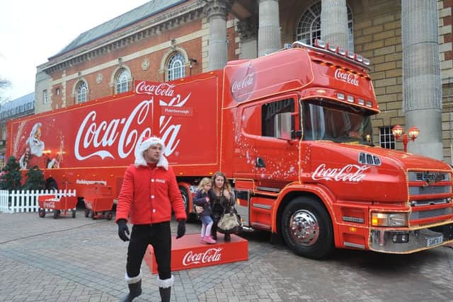Coca-Cola truck in city centre at Bridge street. ENGEMN00120131215155527