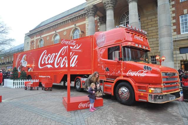 Coca-Cola truck in city centre at Bridge street. ENGEMN00120131215155451
