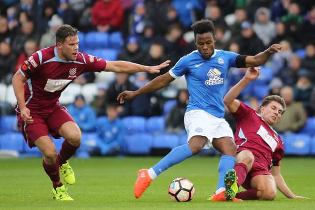 Shaquile Coulthirst fires home the opening goal of the game for Posh against Chesham. Photo: Joe Dent/theposh.com.