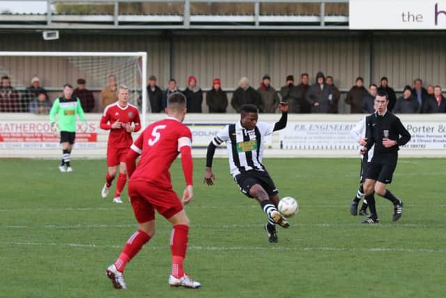 Wilkins Makate of Peterborough Northern Star on the ball at Wisbech. Photo: Tim Gates.