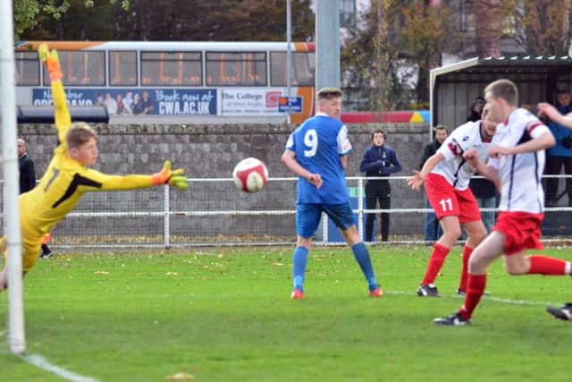 Action from Spalding United's draw with Newcastle Town. Photo: Tim Wilson.